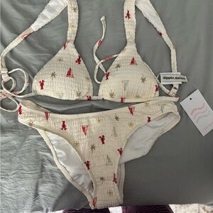 Dippin' Daisy's Cream Textured Bikini with Red & Light Blue Motifs